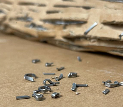 staple & metal shards